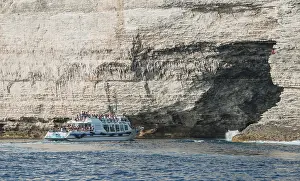 Excursion Boat Prints: Excursion boat visiting cave in chalk cliffs
