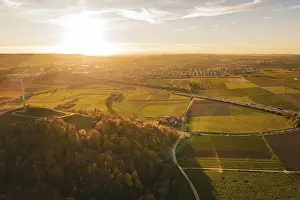 Agricultural Field Photography Prints: Extensive fields and forests under a wide sky at sunset