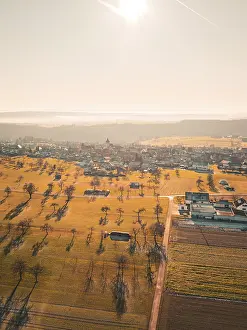 Southern German Autumn Colors Prints: Extensive fields and trees with village in the background