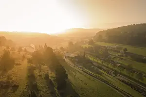 Southern Germany Evening Landscape Prints: Extensive panorama of fields and forests in the soft light of sunset