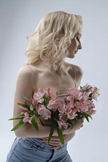 Pink Flower Bouquet Prints: A fair-haired model stands elegantly