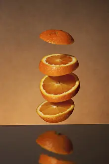 Food Studio Shots Prints: Falling orange slices