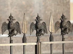 Natural Environment Animal Photography Prints: Fence decorations with Russian Double Headed Eagle close to