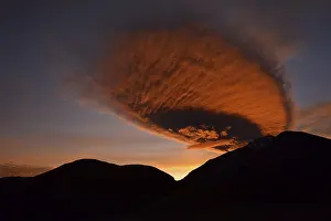 Mountain Chain Scenery Prints: Fiery red clouds above mountain range