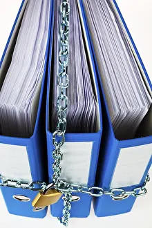 Data Protection Austria Prints: A file folder locked with a chain and padlock