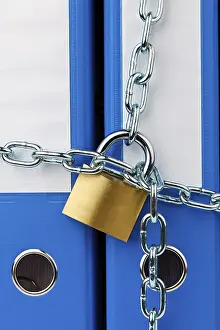 Locked File Folder Prints: A file folder locked with a chain and padlock