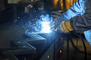 Protective Gear For Workers Prints: Fitters during welding work