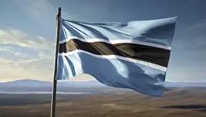 Blue Sky Concept Image Prints: The flag of Botswana flutters in the wind