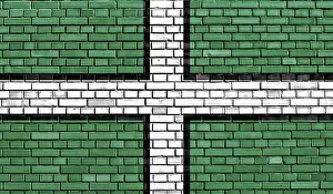 British Nationality Symbol Prints: Flag of Devon painted on brick wall