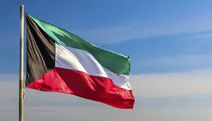 Asian National Flag Prints: The flag of Kuwait flutters in the wind