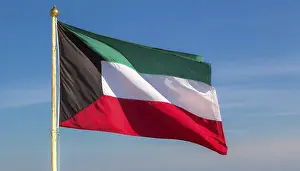 Asian Flags Prints: The flag of Kuwait flutters in the wind