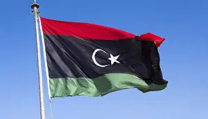 Digital Composing Of A Flag Prints: The flag of Libya, fluttering in the wind