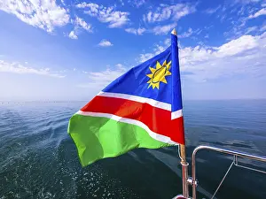 Southern Africa State Flag Prints: Flag of Namibia on a motorboat, Namibia