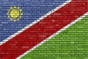 Africa Travel Photography Prints: Flag of Namibia painted on brick wall