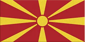 Prints of Flag of North Macedonia. North Macedonia state symbol. Flag on fabric surface. Fabric Texture. National symbol. Republic of North Macedonia. European country North Macedonia Prints: Flag of North Macedonia Print on Fabric Surface