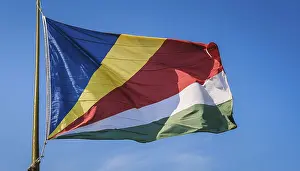 Seychelles Flag Prints: The flag of Seychelles, fluttering in the wind