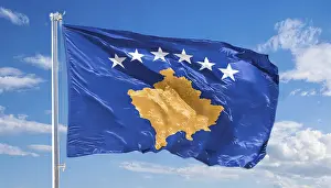 Prints of Flags, the national flag of Kosovo flutters in the wind Kosovo Prints: Kosovo National Flag Print