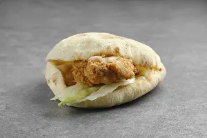 Chicken Fillet Prints: Flat bread with chicken fillet in breading