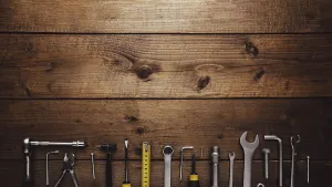 Construction Equipment Prints: Flat lay with various work tools on wooden background working table