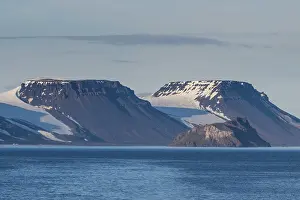 Deserted Russian Islands Prints: Flat table mountains covered with ice