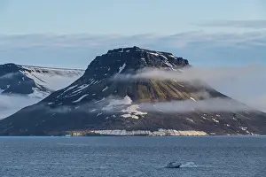 Deserted Island Group Russia Prints: Flat table mountains covered with ice
