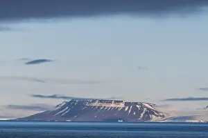 Deserted Island Group Russia Prints: Flat table mountains covered with ice