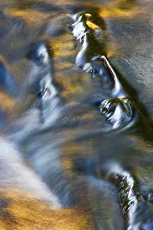 Mountain Torrent Scenery Prints: Flowing water with light reflections