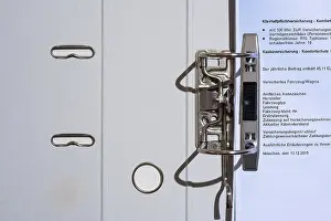 Office Work Prints: Folder with insurance document, top view