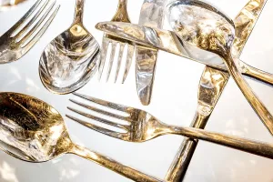 Deserted Dining Table Prints: Fork, spoon and knife with reflections and light effects