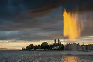 Lake Constance Sunset Prints: Fountain and thunderclouds at sunset