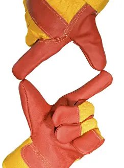 Studio Shot Of Hard Hat Prints: Frame made from red protective gloves