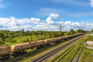 Deserted Train Station Prints: The freight train passes by the station
