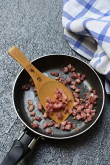 Pork Meat Recipes Prints: Fried bacon cubes in pan, bacon