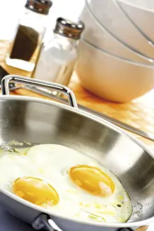 Fried Eggs Prints: Two fried eggs in a pan