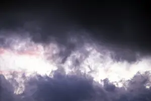Cloudy Mood Landscape Prints: Gap in a dark cloud formation