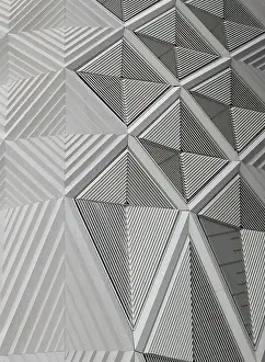 Modern Building Architecture Prints: Geometric white patterns and cladding on wall of a modern building