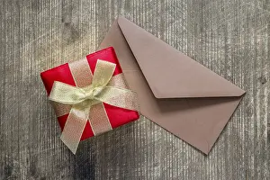 Desk Utensils Stationery Prints: Gift or present box and envelope on the table