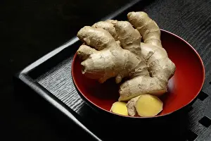 Zingiber Officinale Prints: Ginger, ginger root in tea bowl