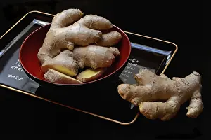 Tea Preparation Hints Prints: Ginger, ginger root in tea bowl