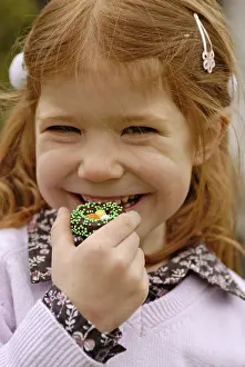 Easter Sweets Prints: Girl eats sweets at easter time