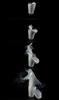 Black Background Food Photography Prints: Glass for Milk exploding against Black Background