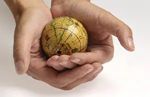 Hand Holding Globe Prints: Globe