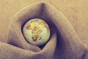 World Geography Map Prints: Globe is placed on canvas background
