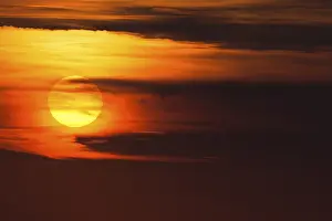Sunset Germany Prints: Glowing sun, sunset with clouds