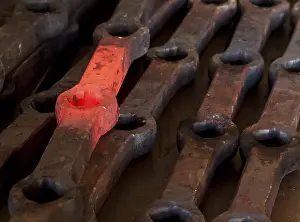 European Handicrafts Prints: Glowing workpiece in a forge, Berlin, Germany