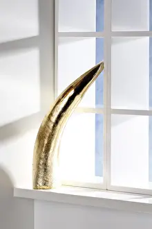 Advent Season Decoration Prints: Golden cornucopia on a windowsill
