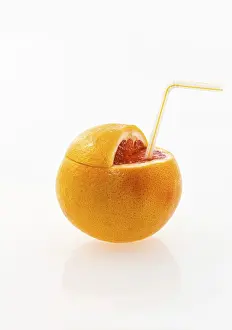 Vitamin Rich Citrus Fruit Prints: Grapefruit with a straw as a drink