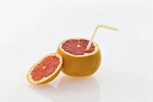 Close Up Citrus Fruit Prints: Grapefruit with a straw as a drink
