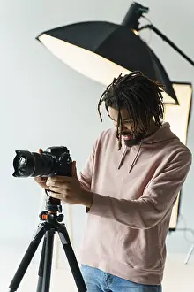 Single Lens Reflex Camera Prints: Grapher preparing camera