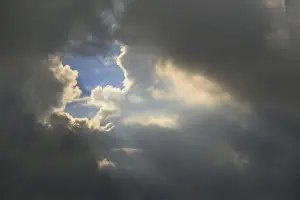 Northern Europe Weather Prints: Gray sky with clouds and sun rays